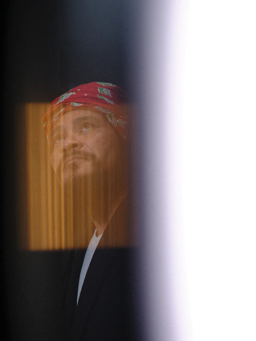 Portrait with red headscarf